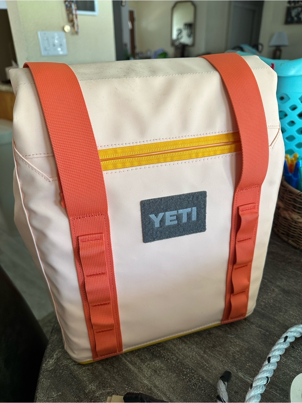 Yeti Pale Pink Backpack with Orange Straps and Yellow Zipper